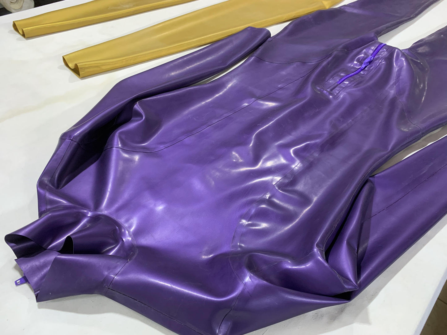 a latex bodysuit zipper crotch