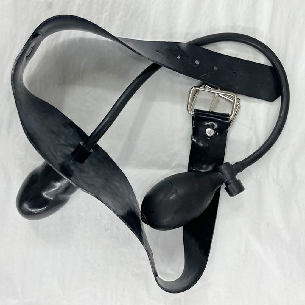 an inflatable mouth gag with latex strap