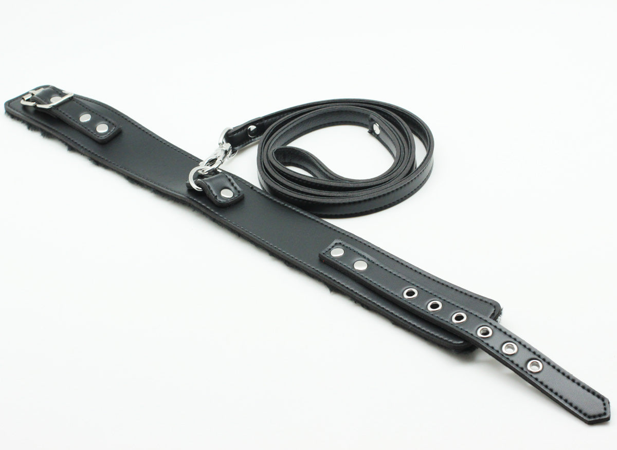 a black BDSM Collar and leash set