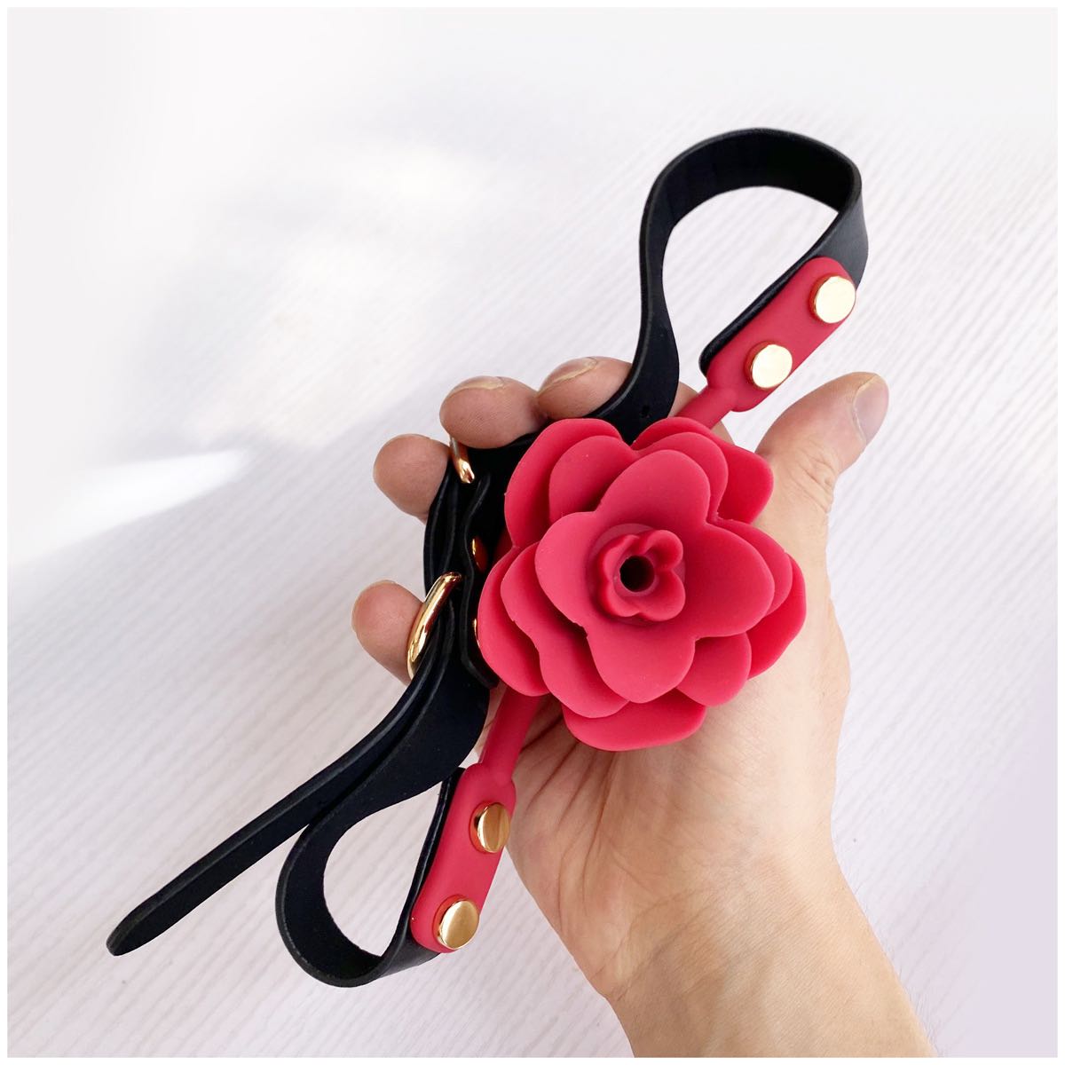 a Silicone Rose Ball Gag