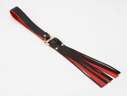 a bdsm paddle flogger