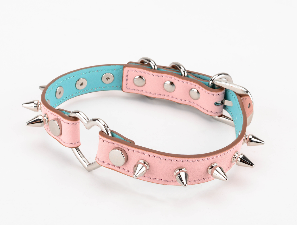  a pink spiked collar choker 