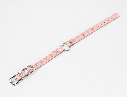  a pink spiked collar choker 