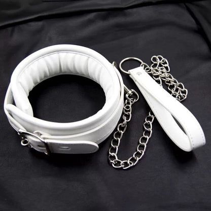 a white leather bondage collar and leash set