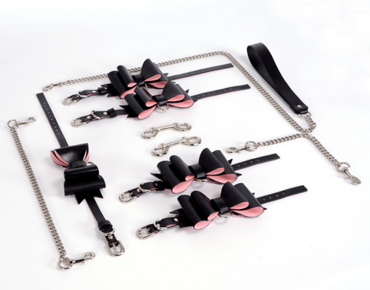 a black and pink bondage set