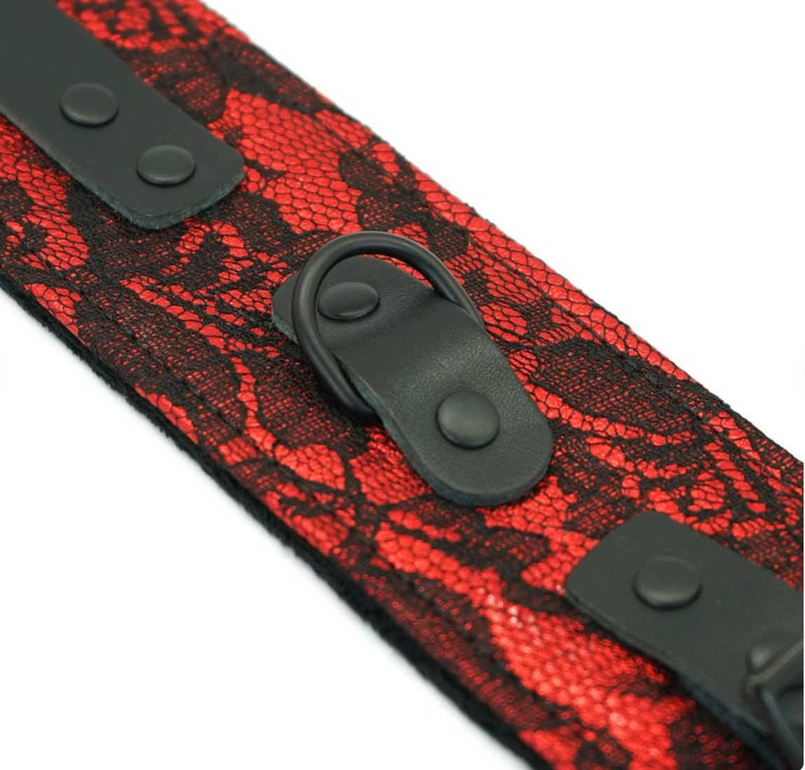 A pair of Red Leather Handcuffs with a chain link connection